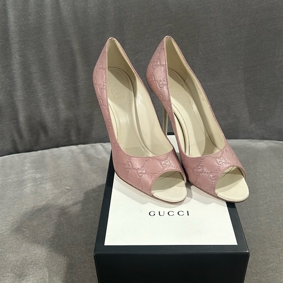 Gucci Shoes - Gucci Monogram heels. Worn once.